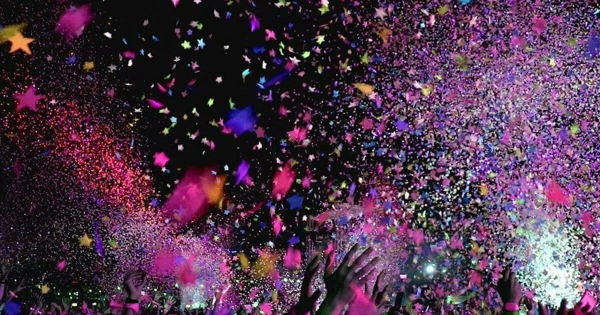 Colourful confetti is fired from the stage